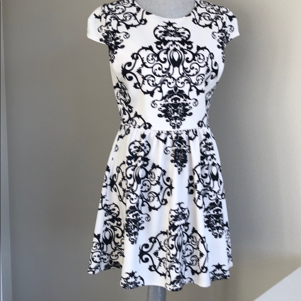 Brocade print knit mini dress